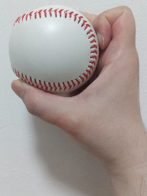 右面から見たナックルカーブの握り方